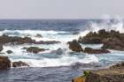 Biscoitos, Terceira Island, Azores, Portugal. Surf crashing on lava rocks. Art Print